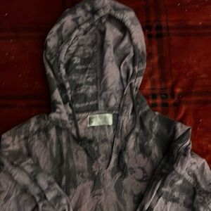 Bali-Kon cotton pull over with drawstring hood and front pocket.